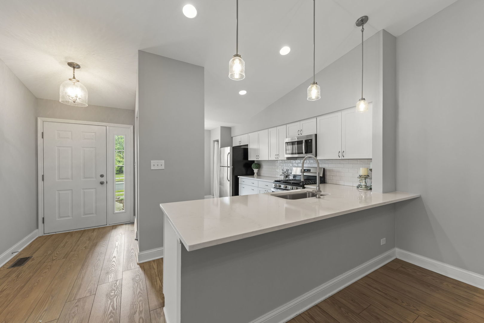 1802 77th Street Naperville, IL 60565 - Photo 10 of 29 a kitchen with counter top space cabinets and appliances