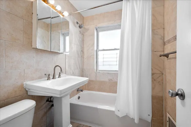 $455,000 | 6707 North Whipple Street, Chicago, IL 60645