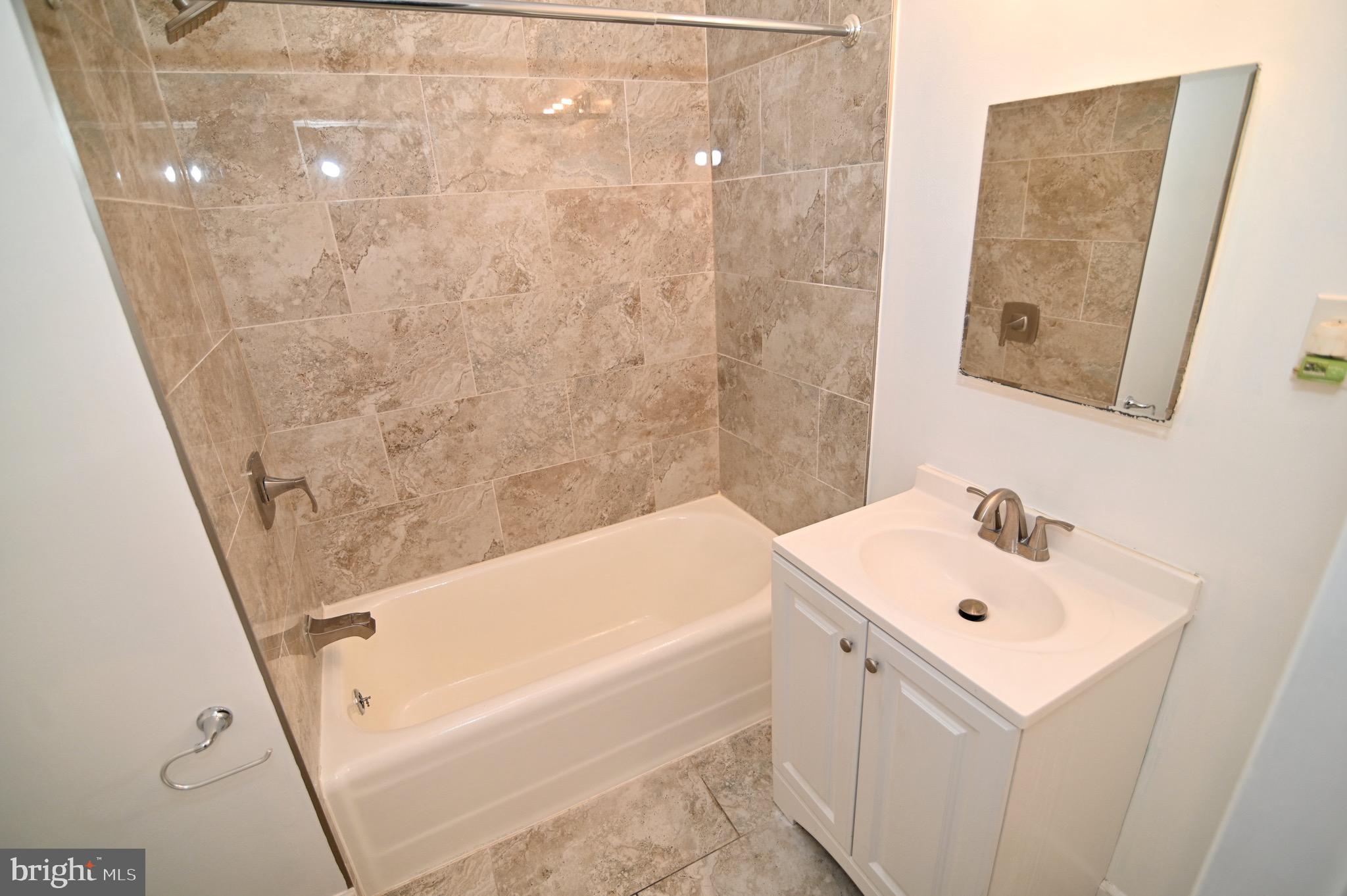 5326 2nd Street Northwest Washington, DC 20011 - Photo 34 of 55 Fresh Tile Hall Bathroom!!