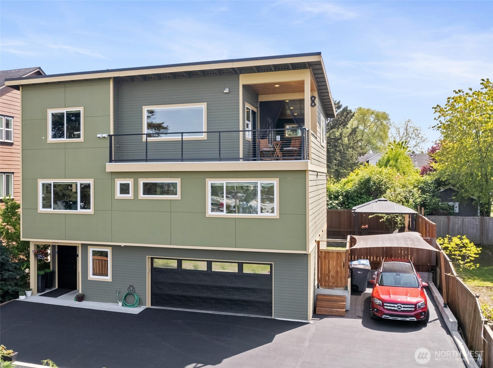1409 Shattuck Avenue South Renton, WA 98055 - Photo 1 of 37 a view of a car park in front of house