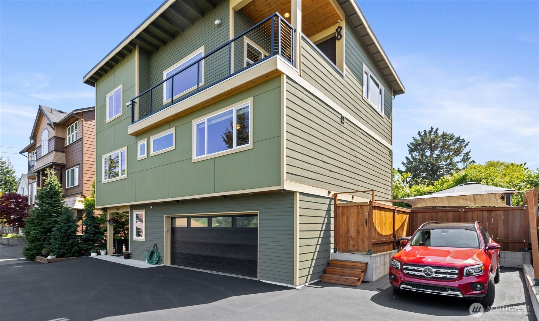 1409 Shattuck Avenue South Renton, WA 98055 - Photo 2 of 37 a car parked in front of a building