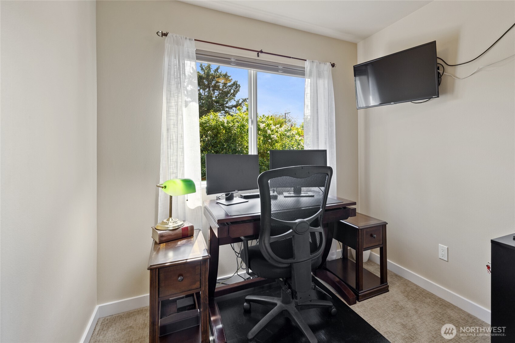 1409 Shattuck Avenue South Renton, WA 98055 - Photo 26 of 37 a view of a workspace with furniture and a window