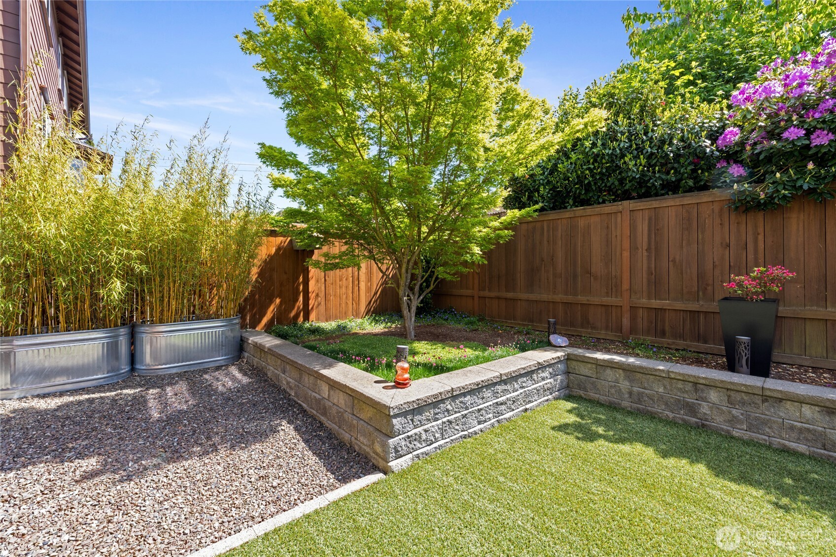 1409 Shattuck Avenue South Renton, WA 98055 - Photo 32 of 37 a view of a backyard with sitting area