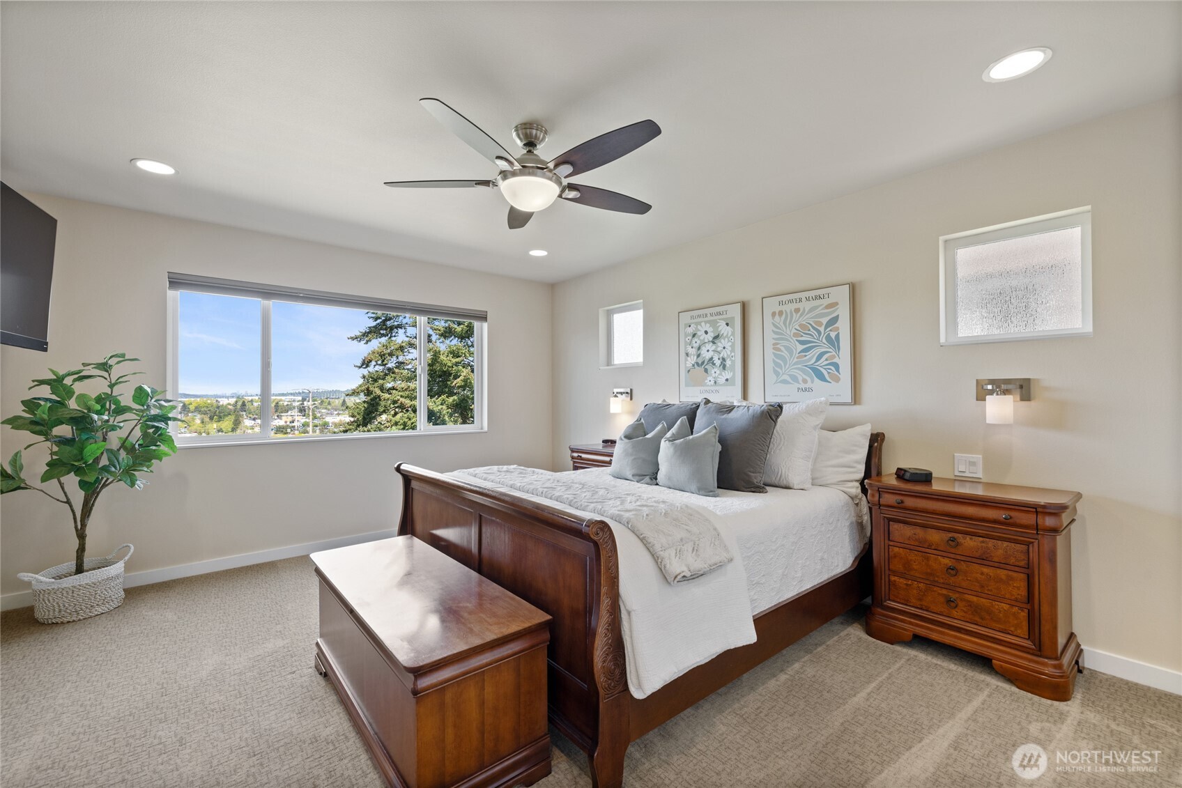 1409 Shattuck Avenue South Renton, WA 98055 - Photo 5 of 37 a bedroom with a bed and a potted plant