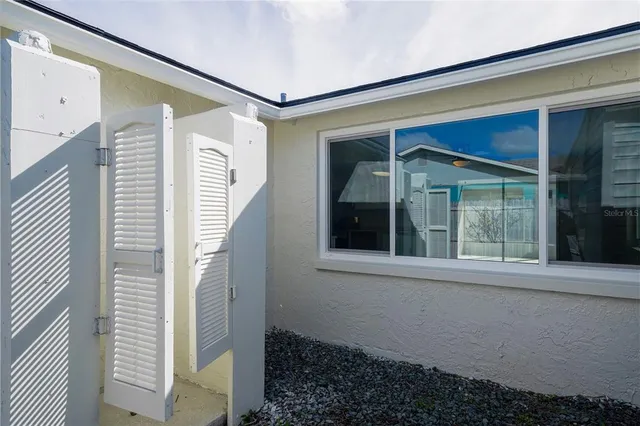 a garden view with a seating space