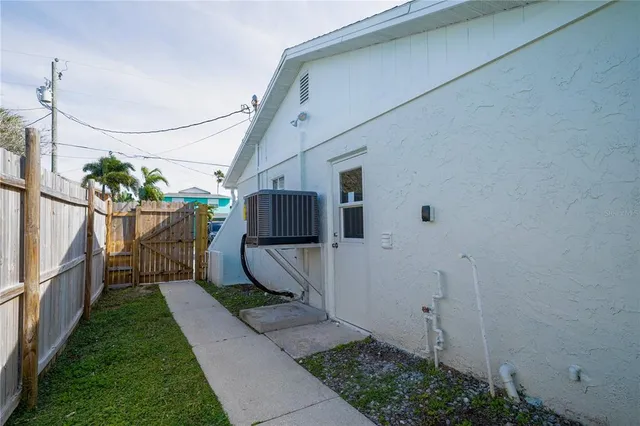a view of an empty room with racks on the wall