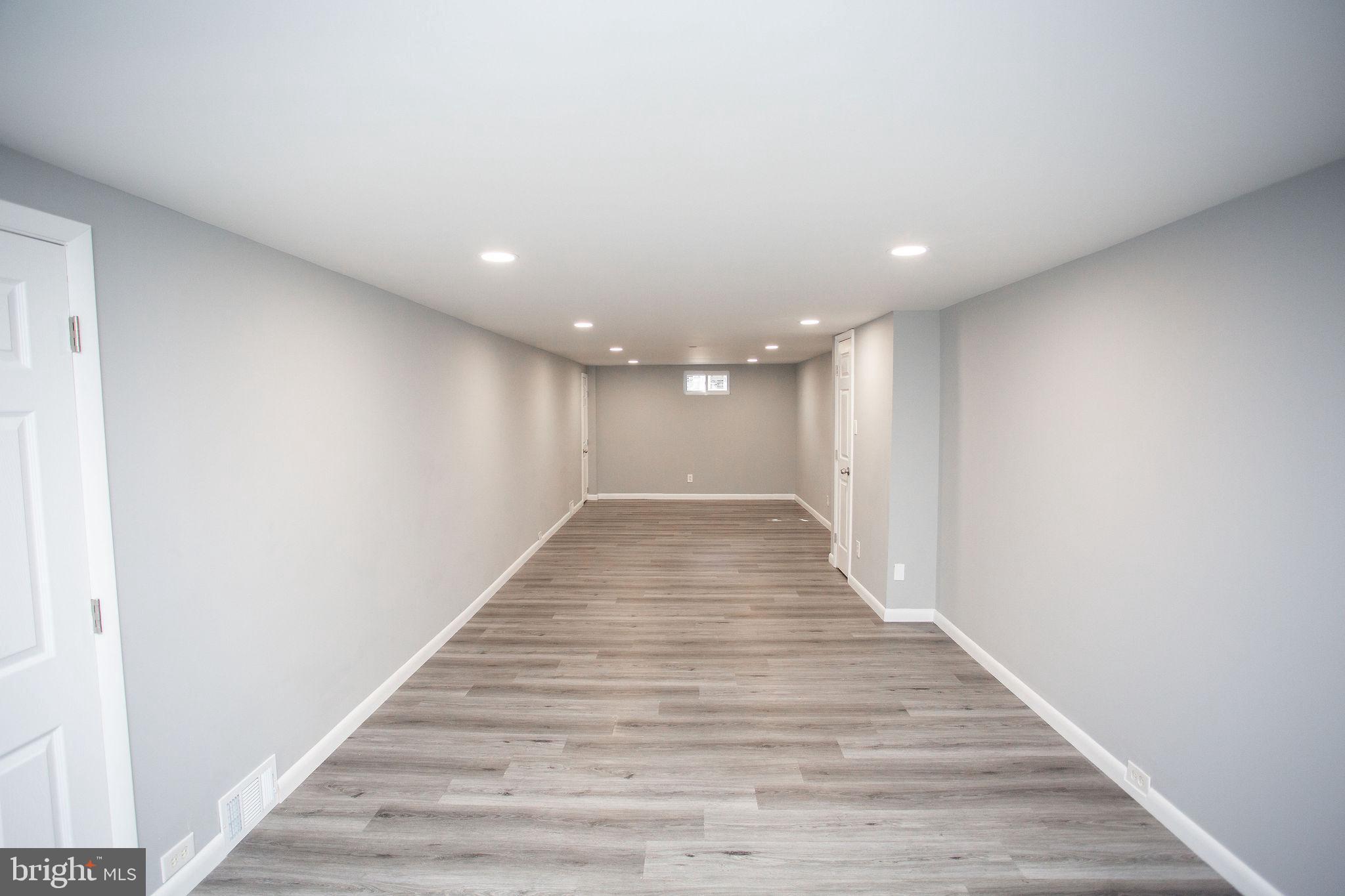 119 Trinity Avenue Blackwood, NJ 08012 - Photo 14 of 37 a view of hallway with wooden floor