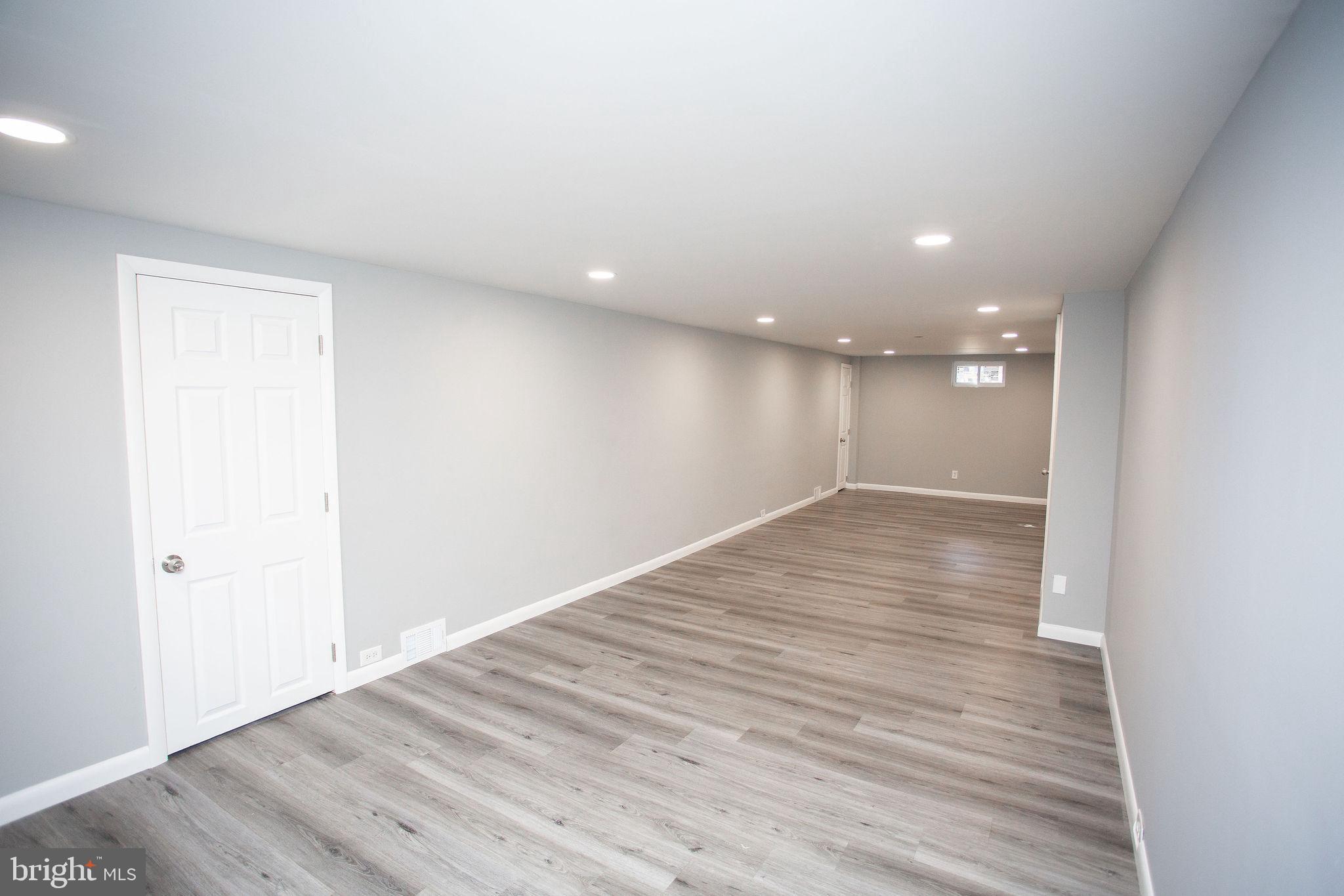 119 Trinity Avenue Blackwood, NJ 08012 - Photo 15 of 37 a view of empty room with wooden floor