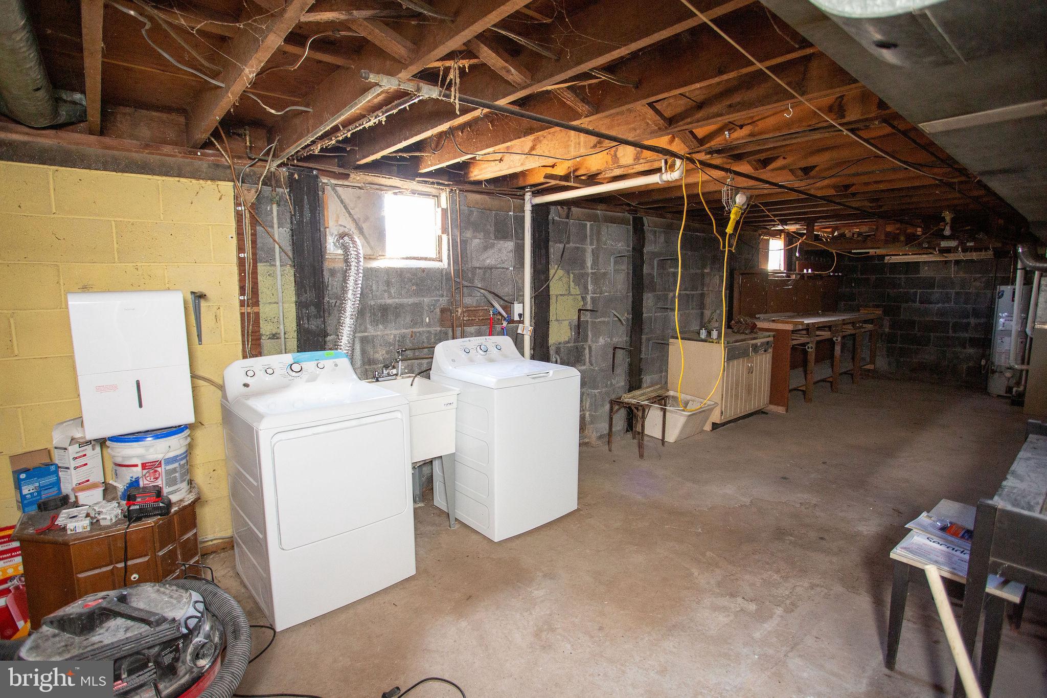 119 Trinity Avenue Blackwood, NJ 08012 - Photo 19 of 37 a view of work room with washer and dryer