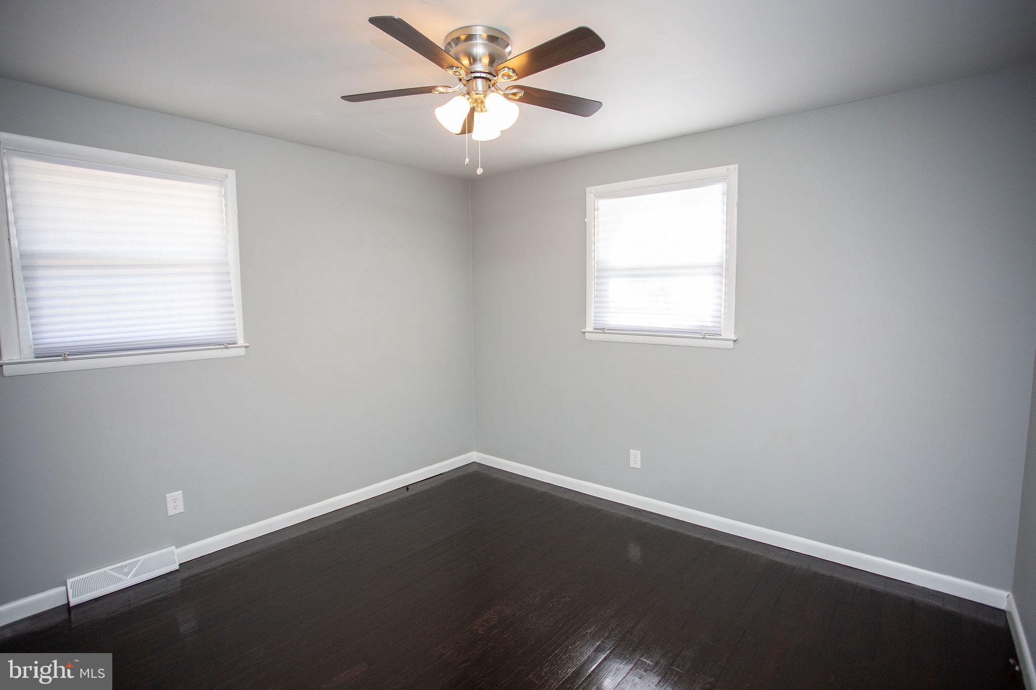 119 Trinity Avenue Blackwood, NJ 08012 - Photo 31 of 37 an empty room with a window and a fan