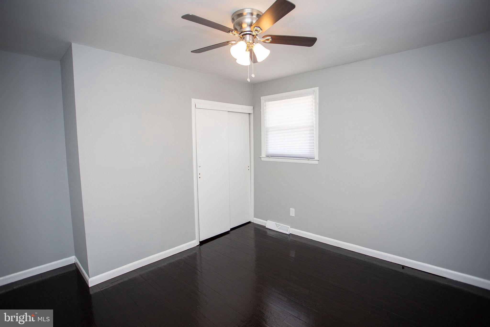 119 Trinity Avenue Blackwood, NJ 08012 - Photo 34 of 37 an empty room with a window and a fan