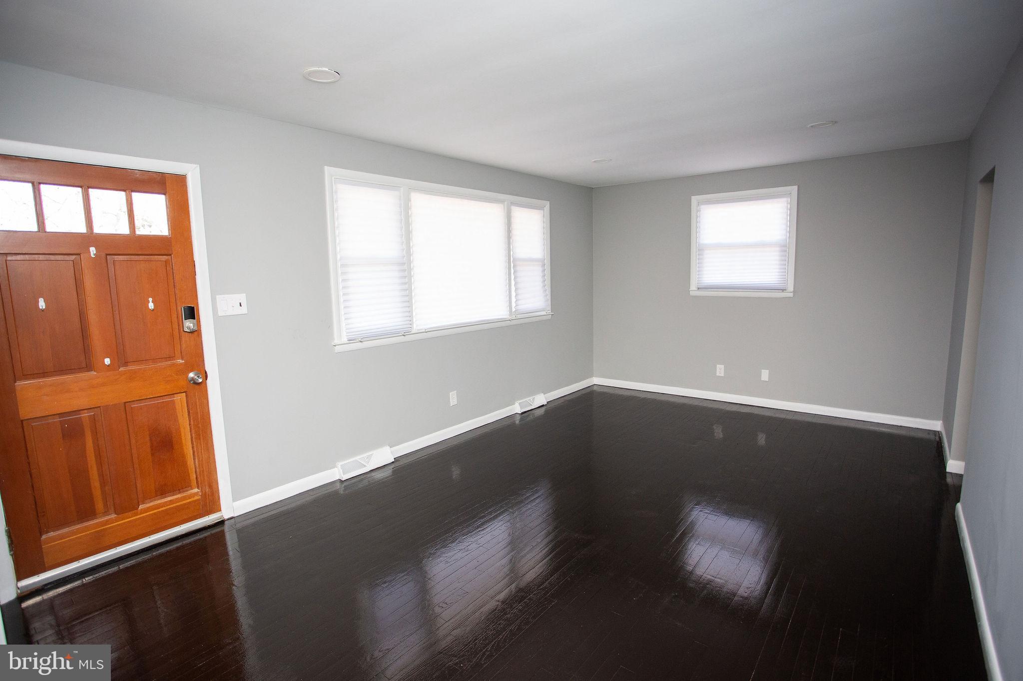 119 Trinity Avenue Blackwood, NJ 08012 - Photo 4 of 37 a view of wooden floor and windows in a room