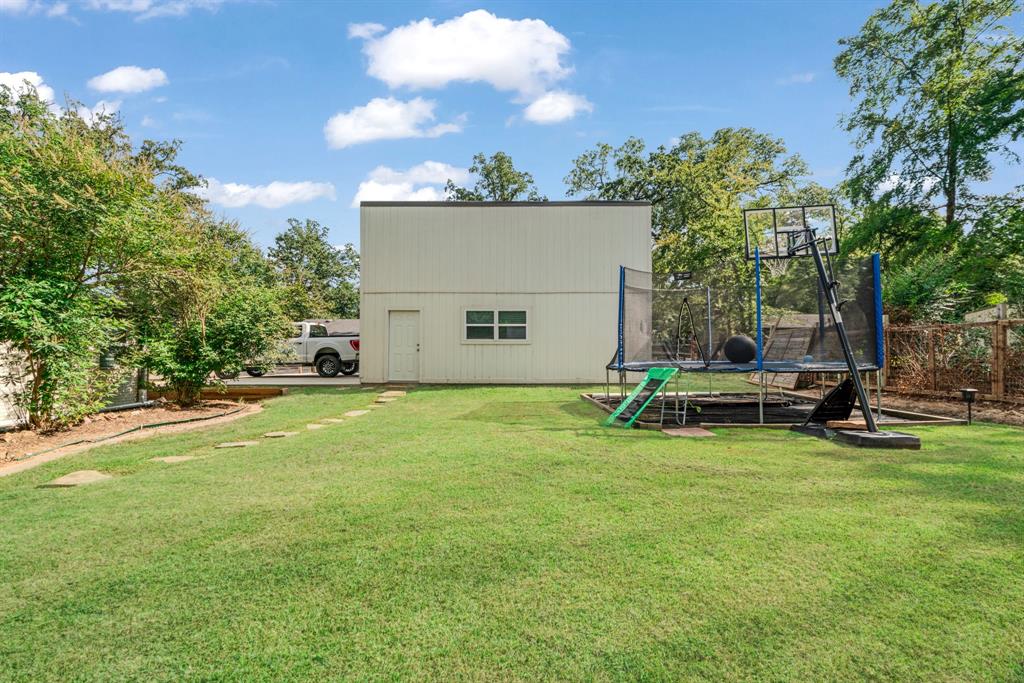1070 Cardinal Lane Paris, TX 75460 - Photo 15 of 20 a view of a house with swimming pool and sitting area