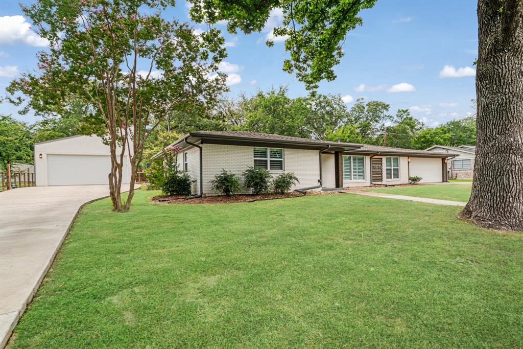 1070 Cardinal Lane Paris, TX 75460 - Photo 19 of 20 a front view of house with a garden