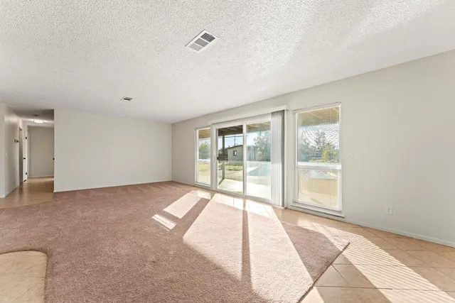 a view of a livingroom with a flat screen tv