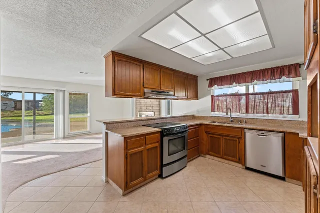 a view of kitchen and utility room