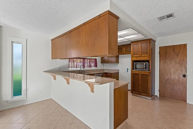 a view of a livingroom with a fireplace