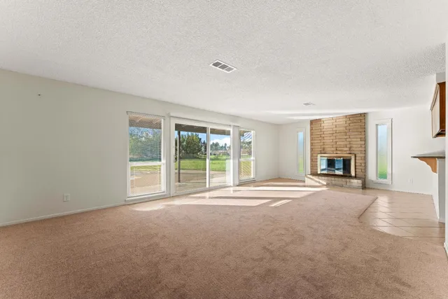 a view of a kitchen with a sink