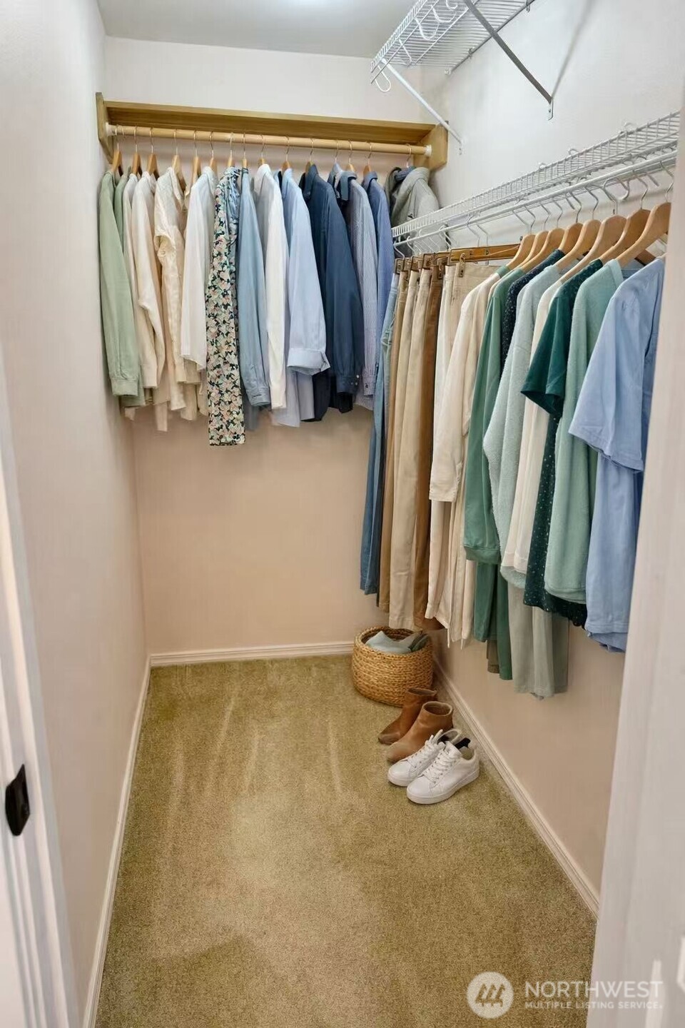 927 132nd Street Southwest, Unit D3 Everett, WA 98204 - Photo 12 of 20 a view of walk in closet with clothes and shoes