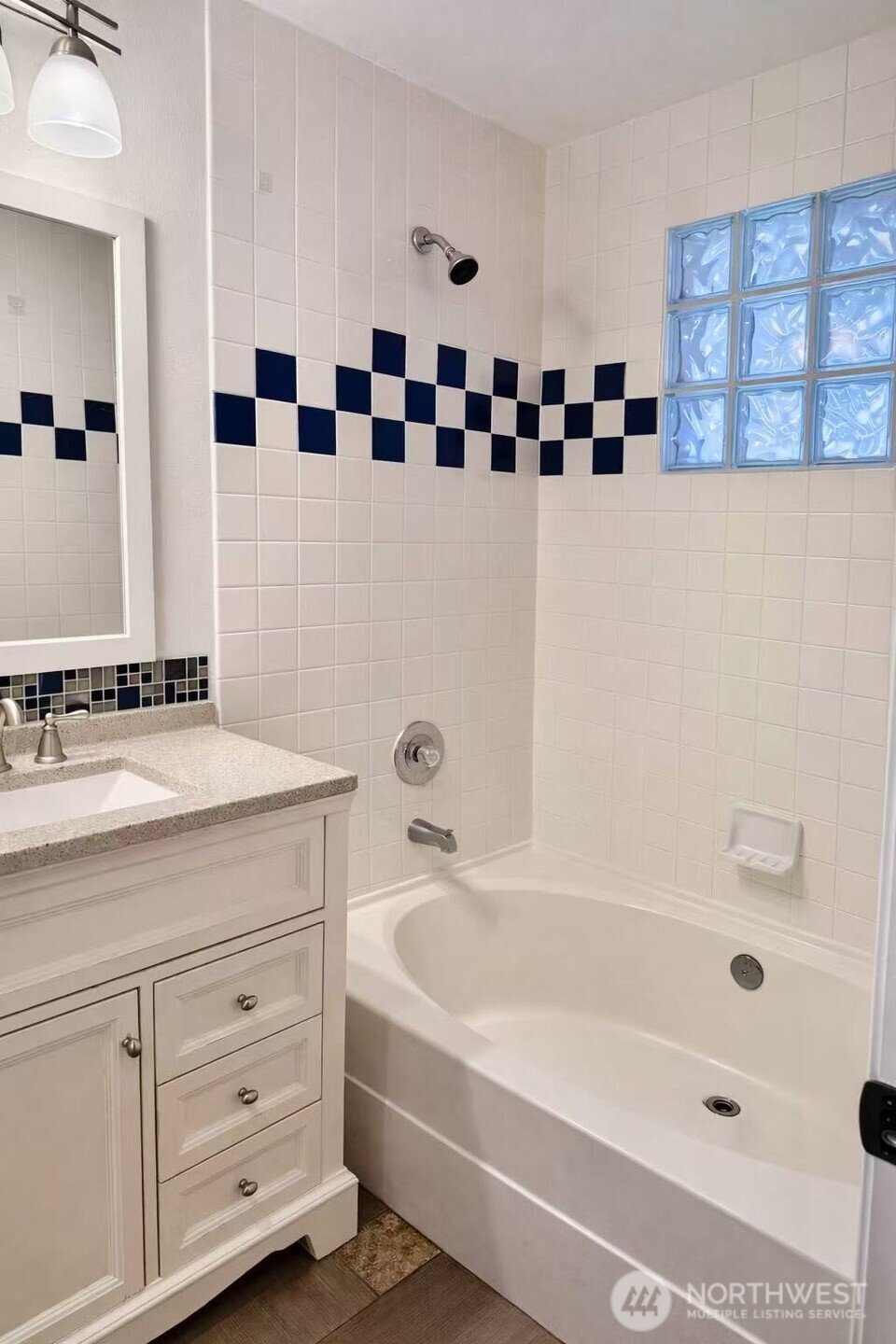 927 132nd Street Southwest, Unit D3 Everett, WA 98204 - Photo 16 of 20 a bathroom with a bathtub and a sink