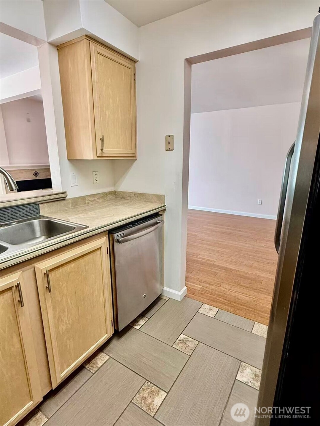 927 132nd Street Southwest, Unit D3 Everett, WA 98204 - Photo 6 of 20 a kitchen with a sink and cabinets