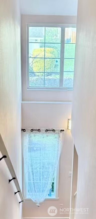 927 132nd Street Southwest, Unit D3 Everett, WA 98204 - Photo 9 of 20 a view of a living room with furniture and a window
