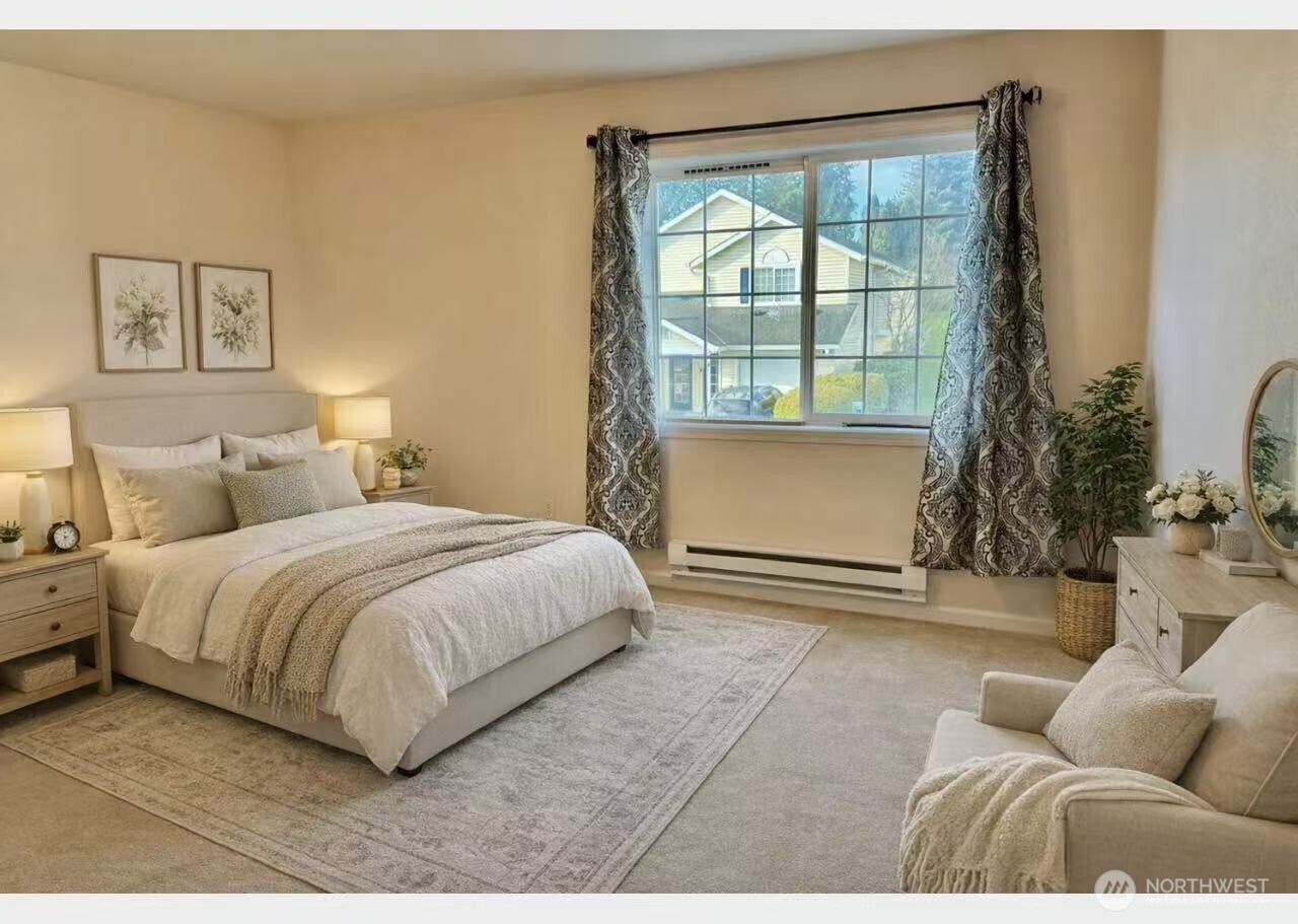 927 132nd Street Southwest, Unit D3 Everett, WA 98204 - Photo 10 of 20 a spacious bedroom with a bed and a large window
