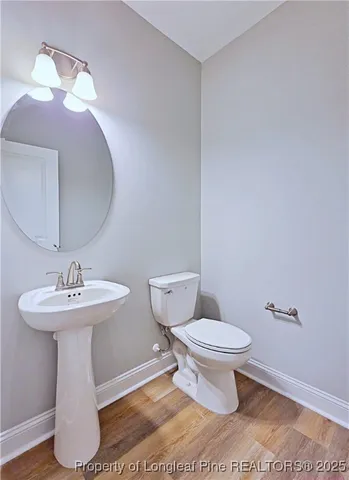 a view of an empty room and closet area