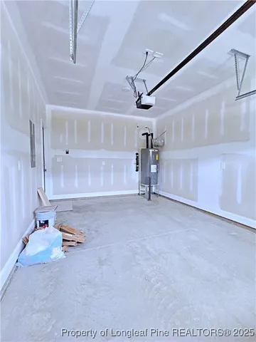 a front view of a house with a garden and plants