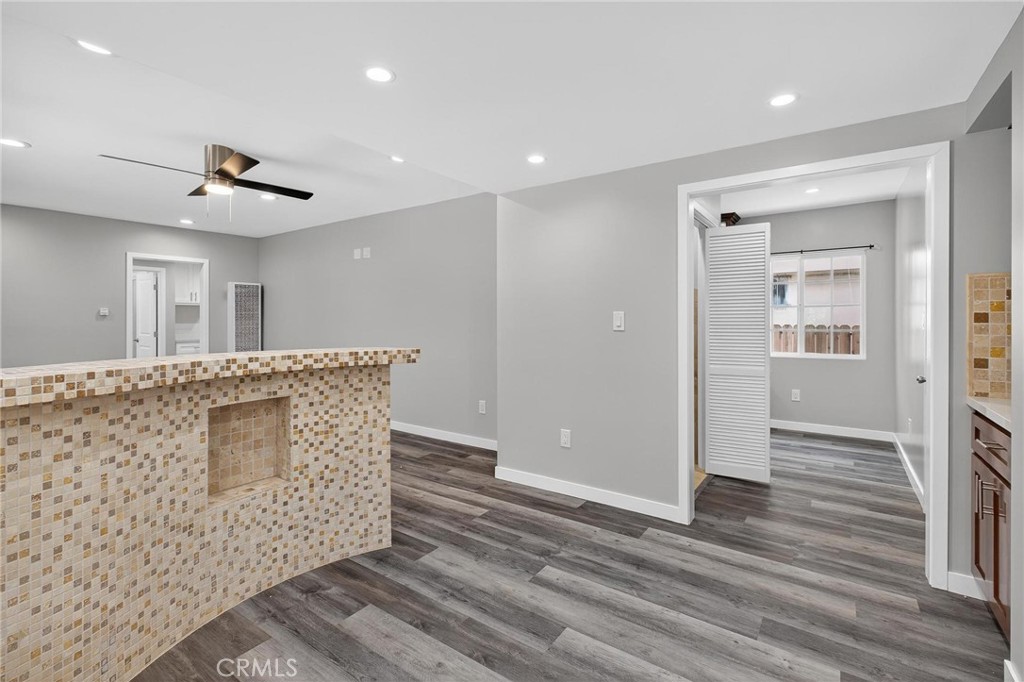 625 East 99th Street Inglewood, CA 90301 - Photo 26 of 50 a bathroom with a sink a mirror and a shower