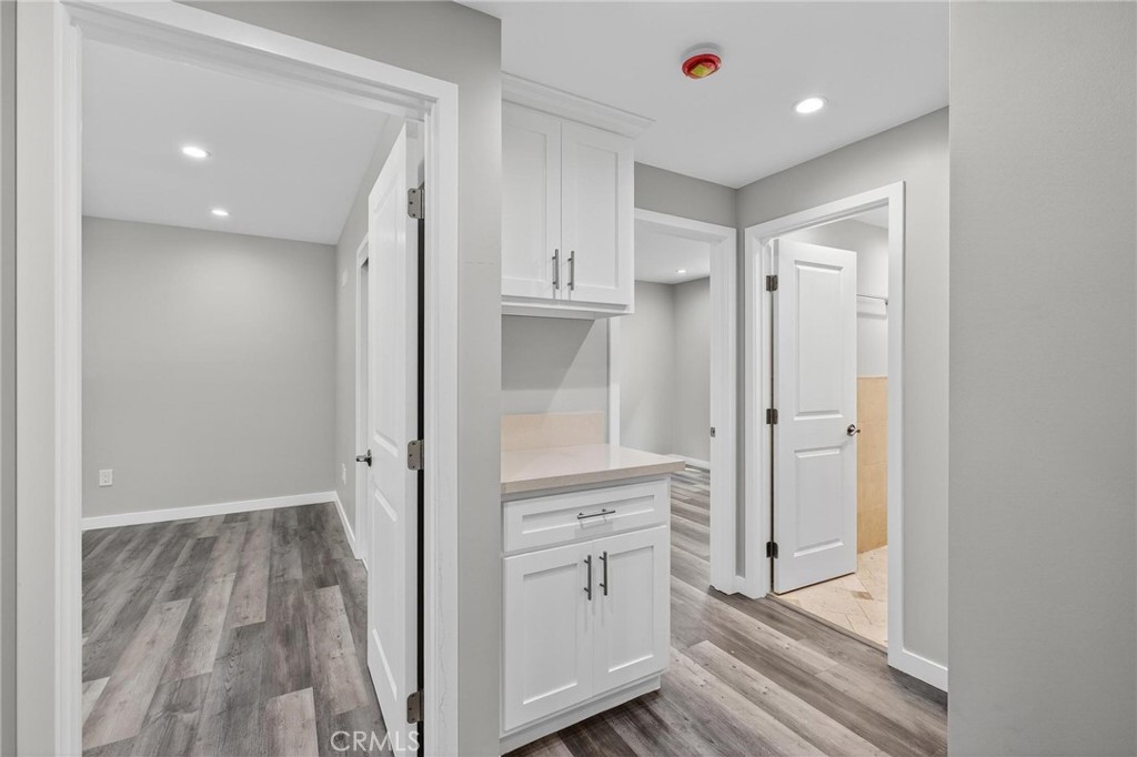 625 East 99th Street Inglewood, CA 90301 - Photo 32 of 50 a view of empty room with wooden floor