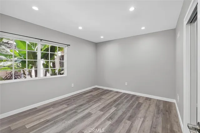 wooden floor and windows in a room