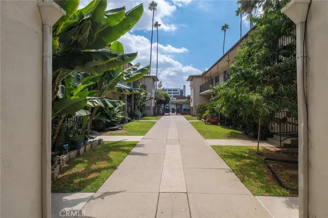a view of street with small yard