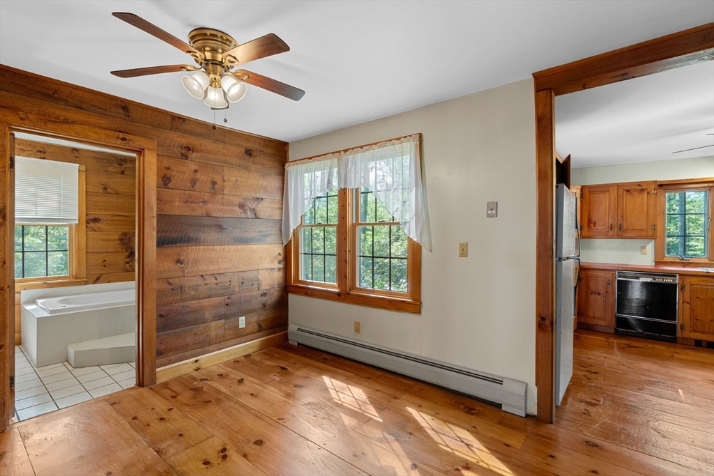 362 Snows Pond Road Rochester, MA 02770 - Photo 12 of 41 wooden floor in an empty room with a window