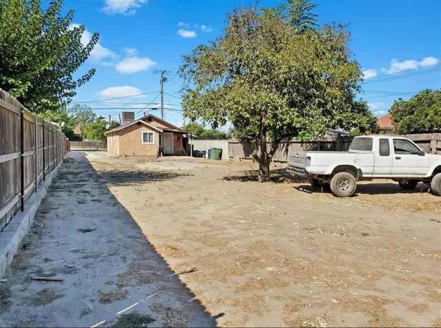 a car parked in front of a house