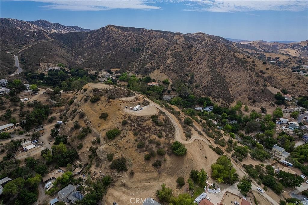 85 Apricot Lane Simi Valley, CA 93063 - Photo 13 of 14 an aerial view of mountain with residential house and mountains in the background