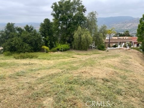 85 Apricot Lane Simi Valley, CA 93063 - Photo 2 of 14 a view of a yard with a house