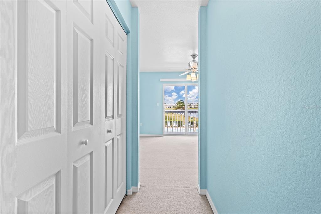 26346 Rampart Boulevard, Unit 904 Punta Gorda, FL 33983 - Photo 11 of 35 wooden floor in a gallery
