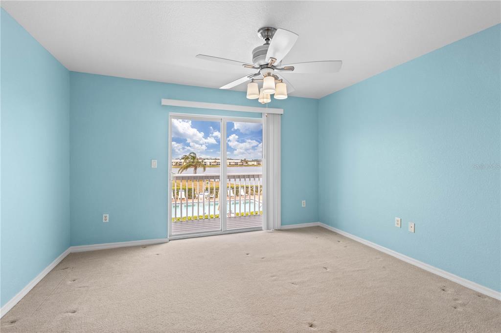 26346 Rampart Boulevard, Unit 904 Punta Gorda, FL 33983 - Photo 12 of 35 a view of an empty room with a window