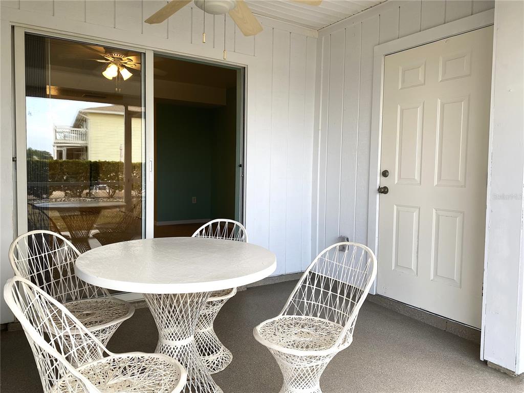 26346 Rampart Boulevard, Unit 904 Punta Gorda, FL 33983 - Photo 21 of 35 a view of a dining room with furniture