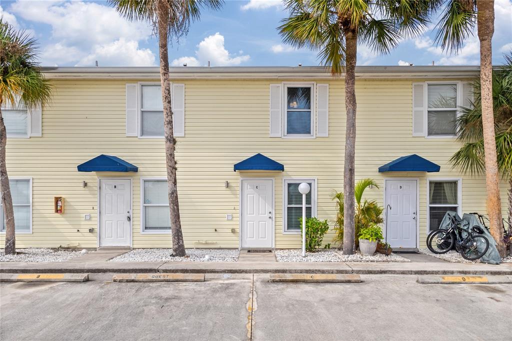 26346 Rampart Boulevard, Unit 904 Punta Gorda, FL 33983 - Photo 27 of 35 a front view of a house with a patio