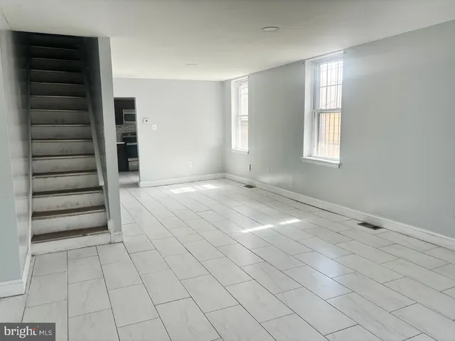 an empty room with windows