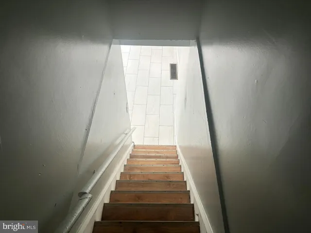 a view of a brick buildings from a balcony