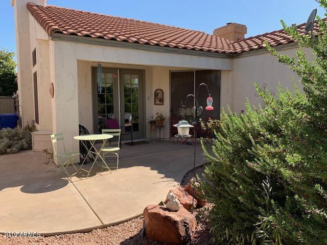 3440 East Southern Avenue, Unit 1118 Mesa, AZ 85204 - Photo 2 of 2 a view of a house with sitting area and chair