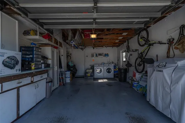 an aerial view of a house with a garden and plants