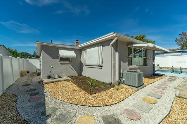 a view of a house with swimming pool