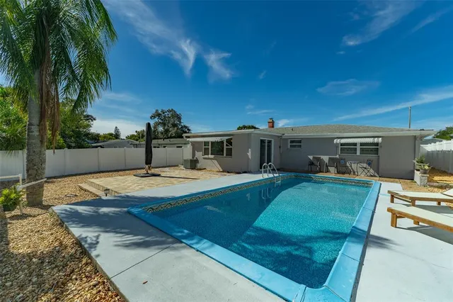 front view of a house with a patio