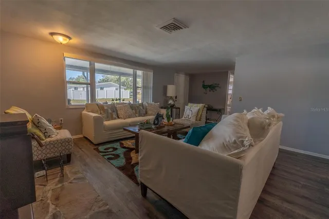 a view of a dining room with furniture