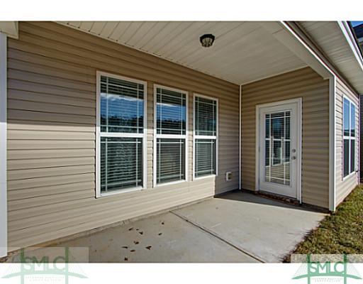 56 Spring Lakes Circle Savannah, GA 31407 - Photo 20 of 25 Exterior Back. Patio