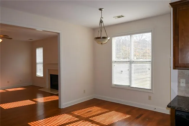 a view of balcony with wooden floor